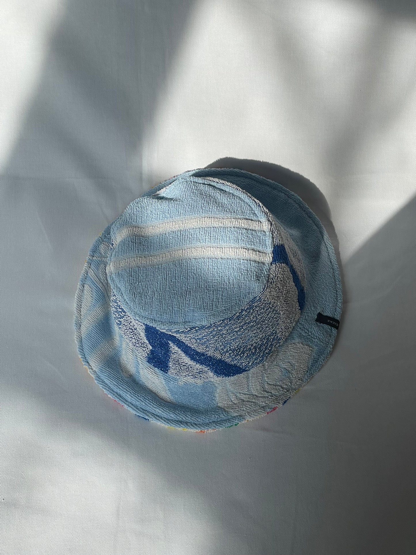 SAMPLE Reversible Bucket Hat blue rainbow / L